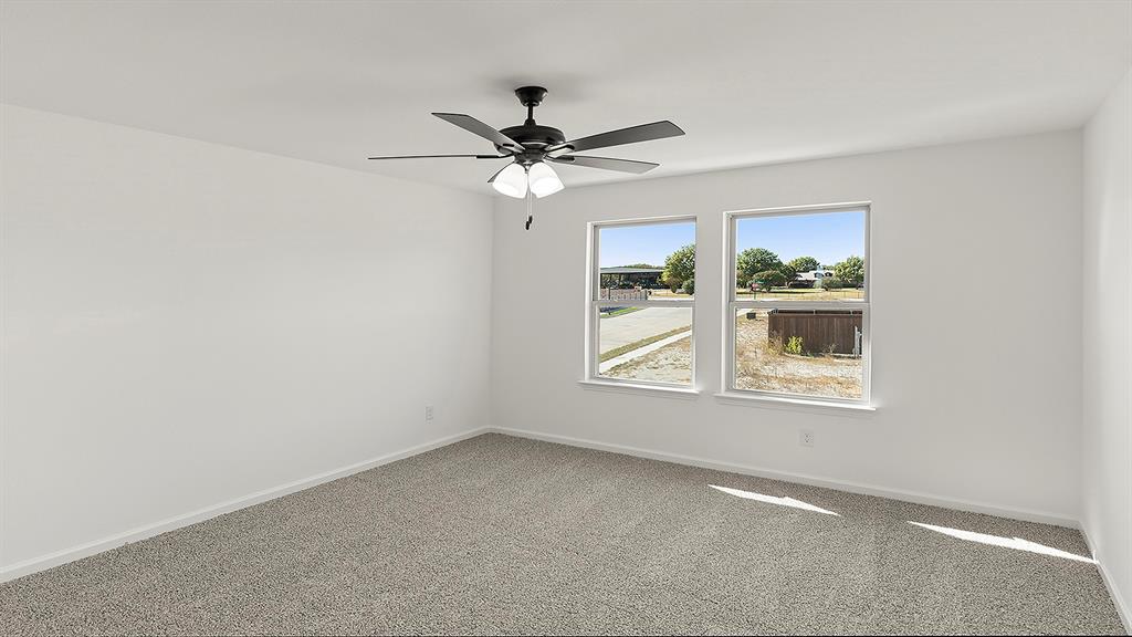 2524 YO Rnch Road Anna, TX 75409 - Photo 15 of 30 an empty room with windows and fan