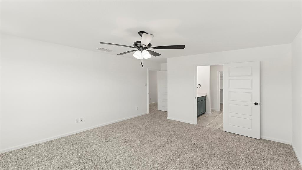 2524 YO Rnch Road Anna, TX 75409 - Photo 16 of 30 a view of a chandelier fan in a room
