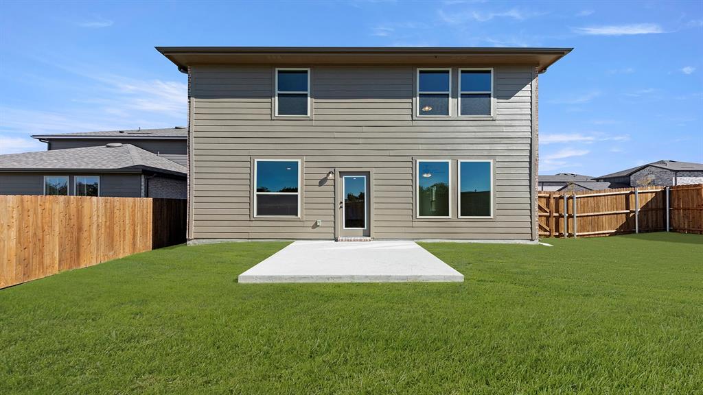 2524 YO Rnch Road Anna, TX 75409 - Photo 26 of 30 a front view of a house with a yard