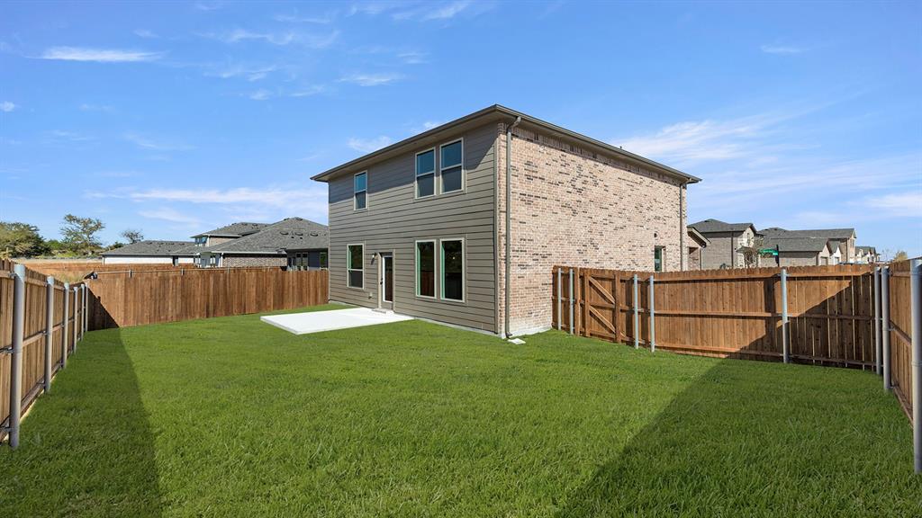 2524 YO Rnch Road Anna, TX 75409 - Photo 27 of 30 a view of a house with a yard and sitting area