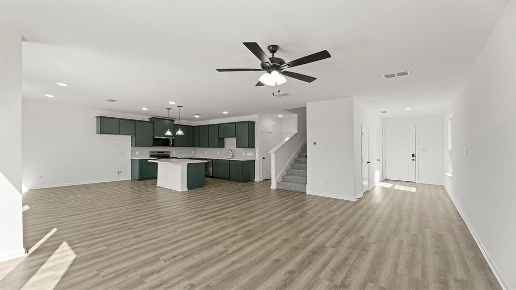 2524 YO Rnch Road Anna, TX 75409 - Photo 10 of 30 a view of kitchen with wooden floor
