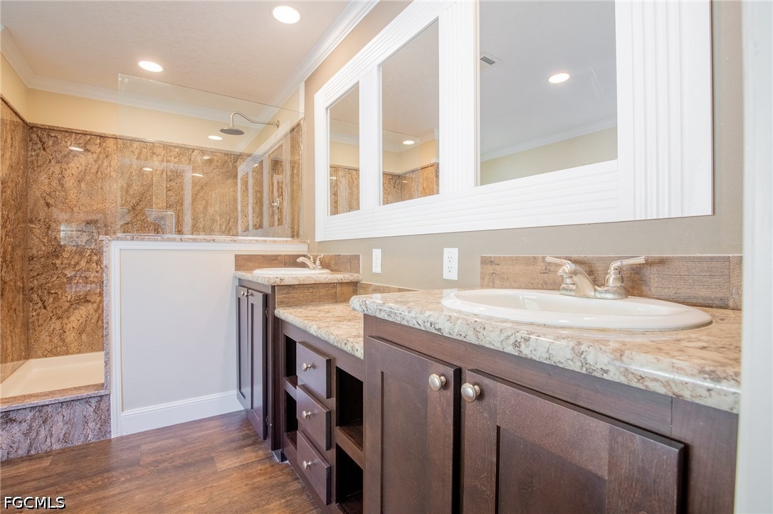 1580 Ridgdill Road Clewiston, FL 33440 - Photo 16 of 30 a bathroom with a granite countertop sink and a mirror