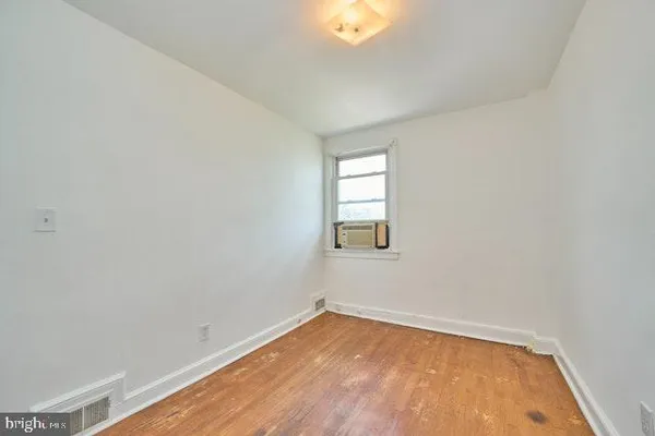 an empty room with a window