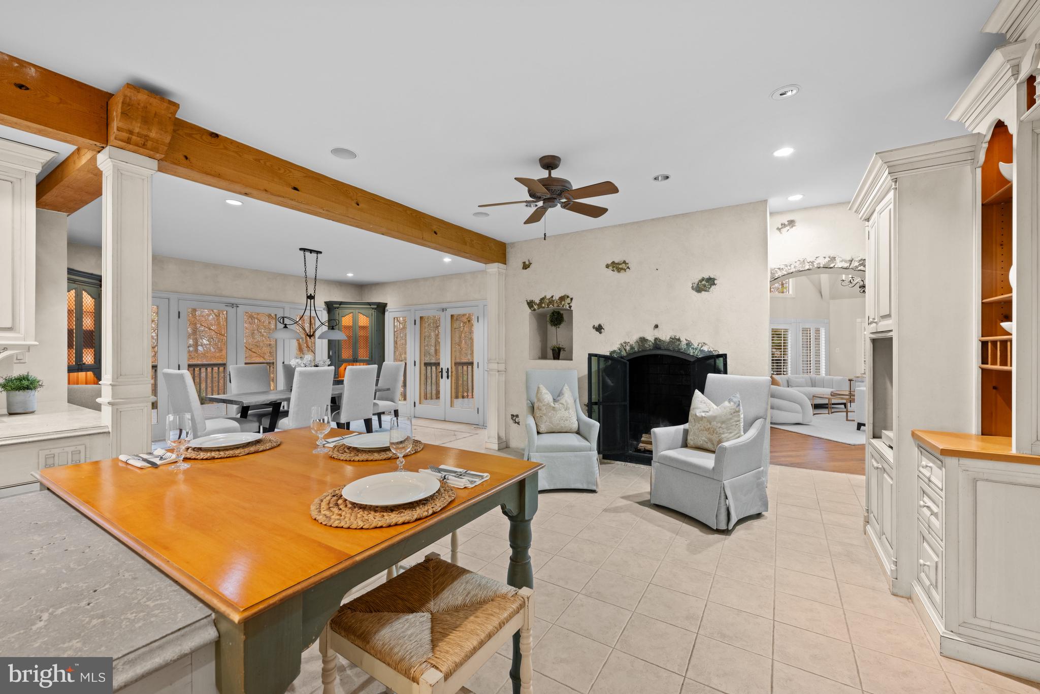 11552 Springridge Road Potomac, MD 20854 - Photo 15 of 65 a living room with fireplace furniture and a chandelier