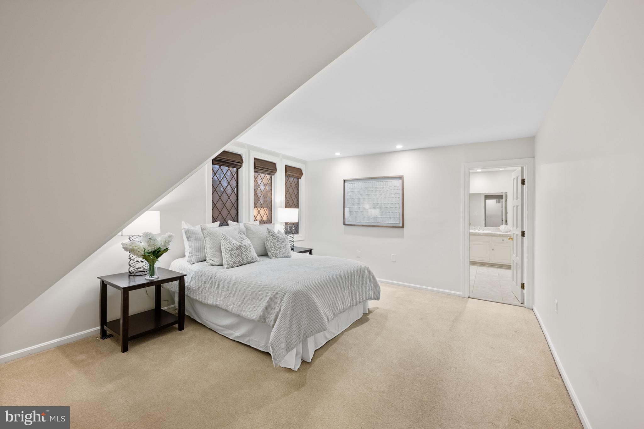 11552 Springridge Road Potomac, MD 20854 - Photo 38 of 65 a bedroom with a bed and a cabinets