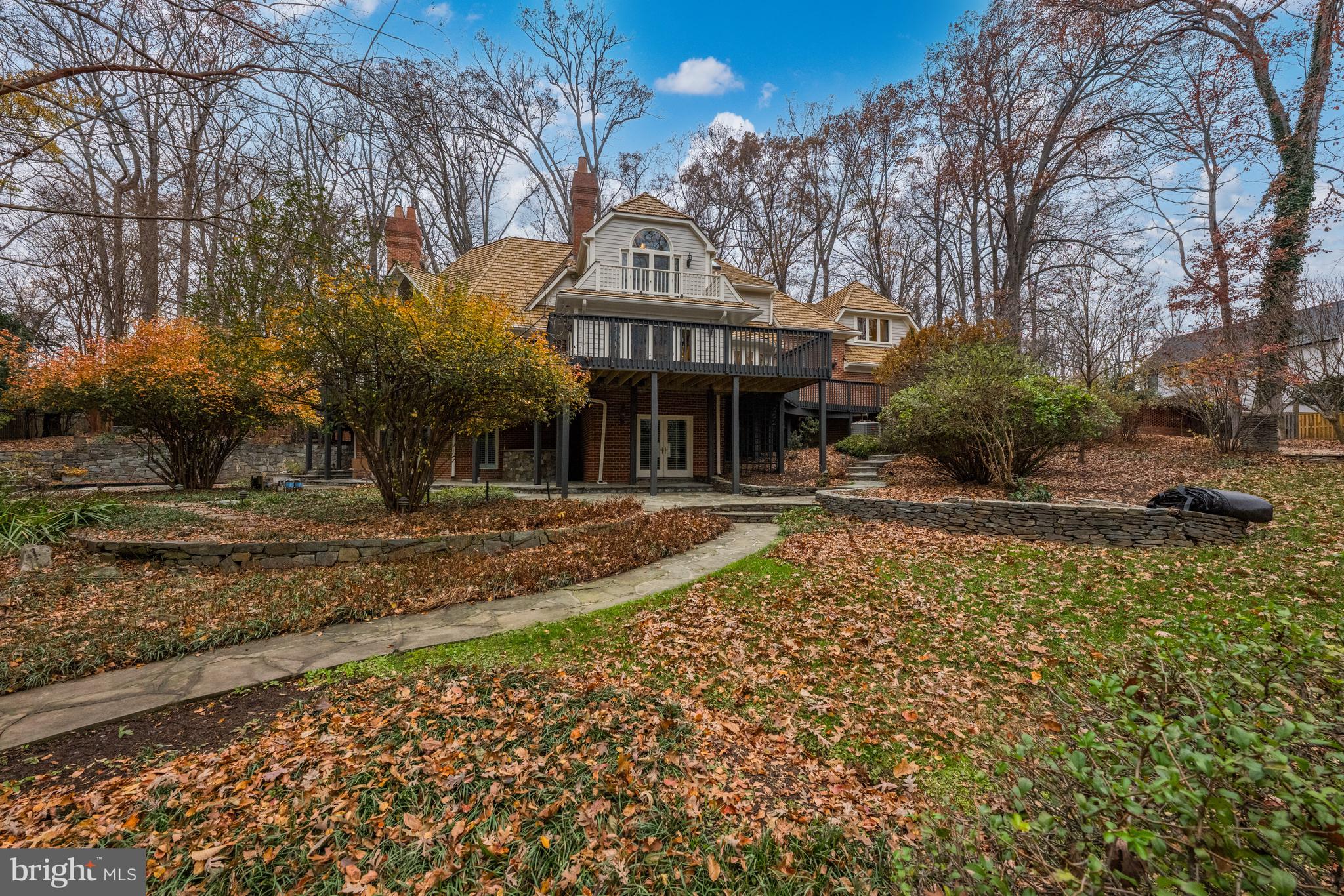 11552 Springridge Road Potomac, MD 20854 - Photo 4 of 65 a front view of a house with a yard