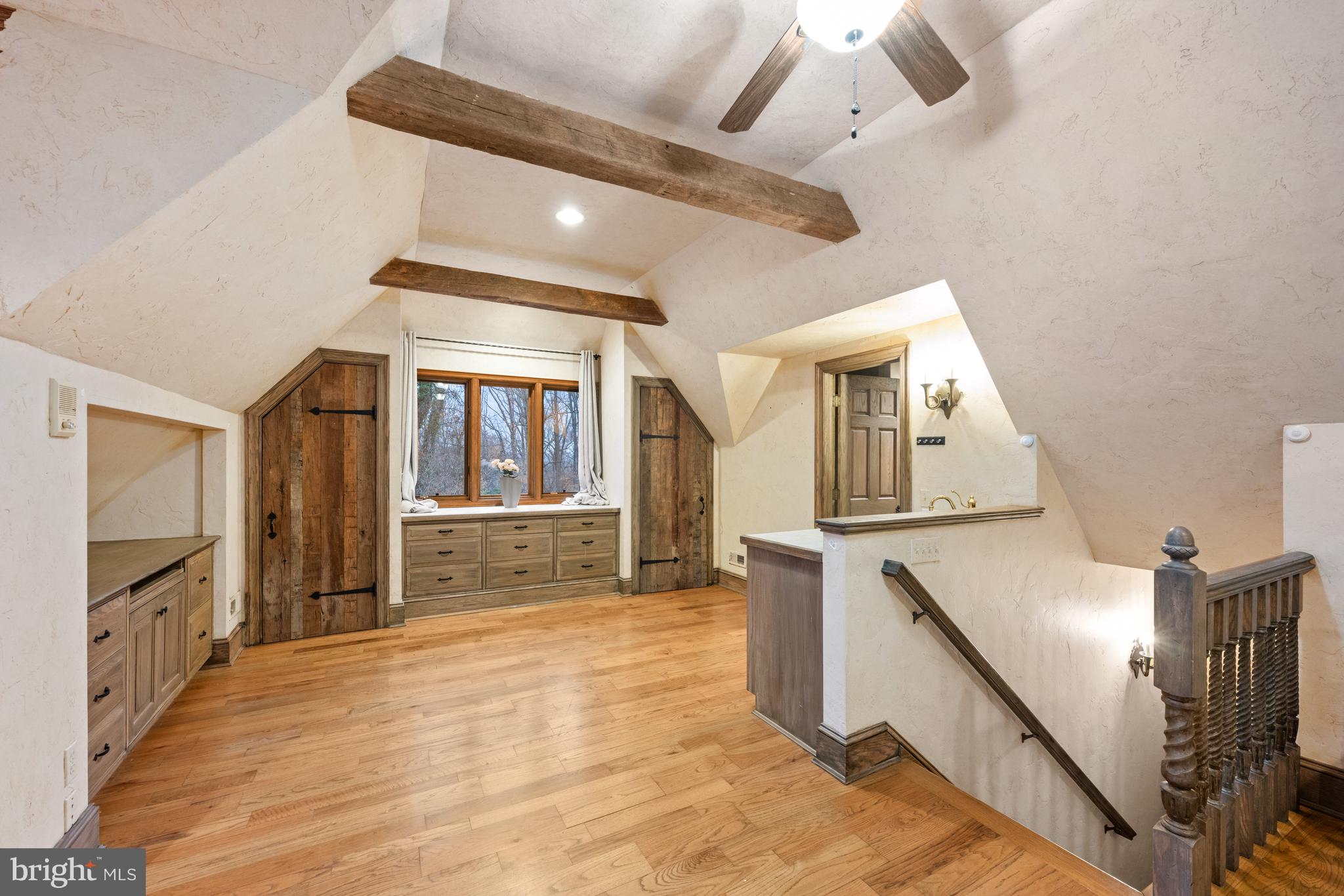 11552 Springridge Road Potomac, MD 20854 - Photo 43 of 65 a view of a kitchen with furniture and a ceiling fan