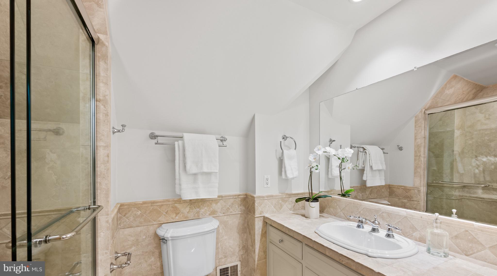 11552 Springridge Road Potomac, MD 20854 - Photo 47 of 65 a bathroom with a sink and a mirror