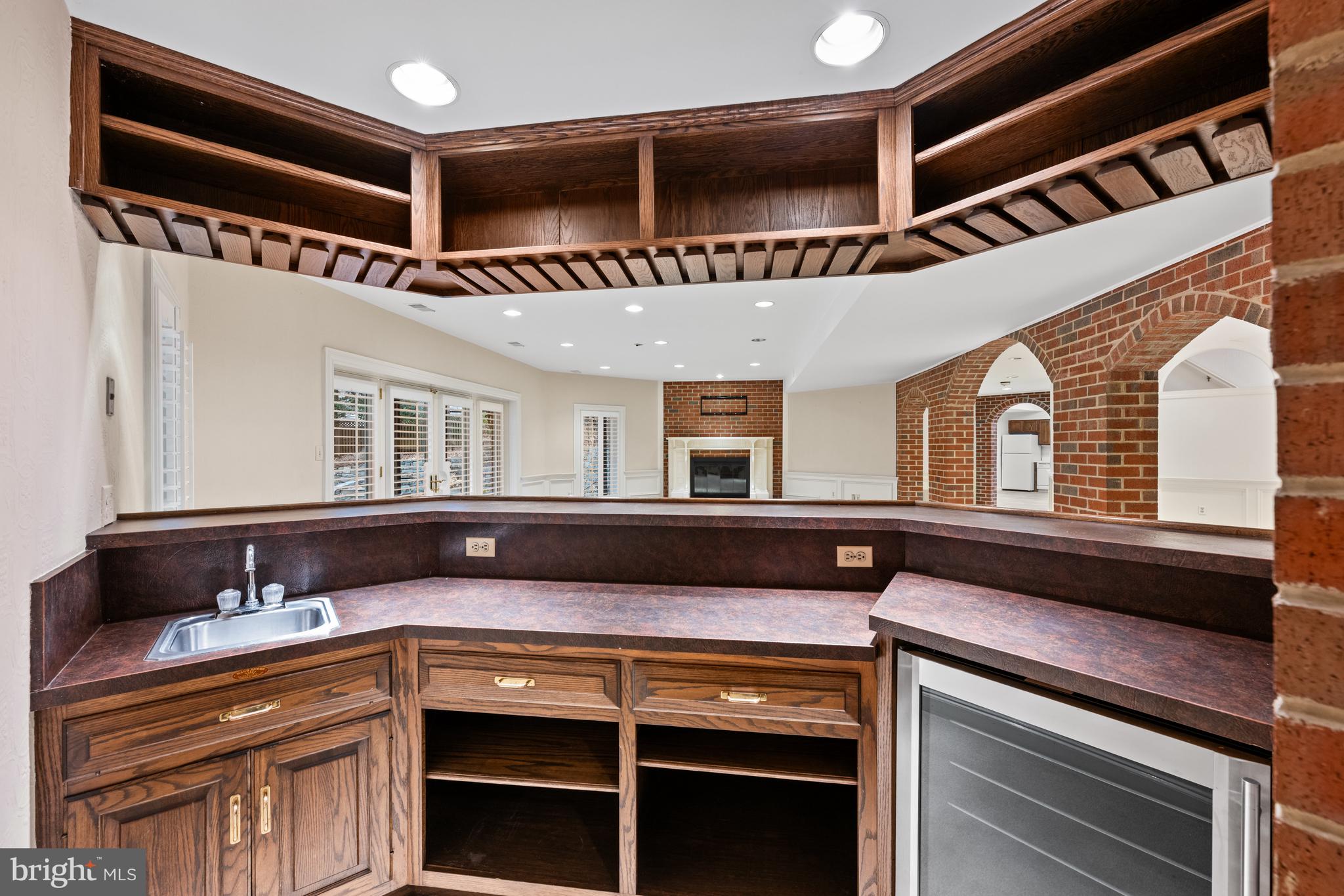 11552 Springridge Road Potomac, MD 20854 - Photo 52 of 65 a kitchen with a refrigerator and a sink