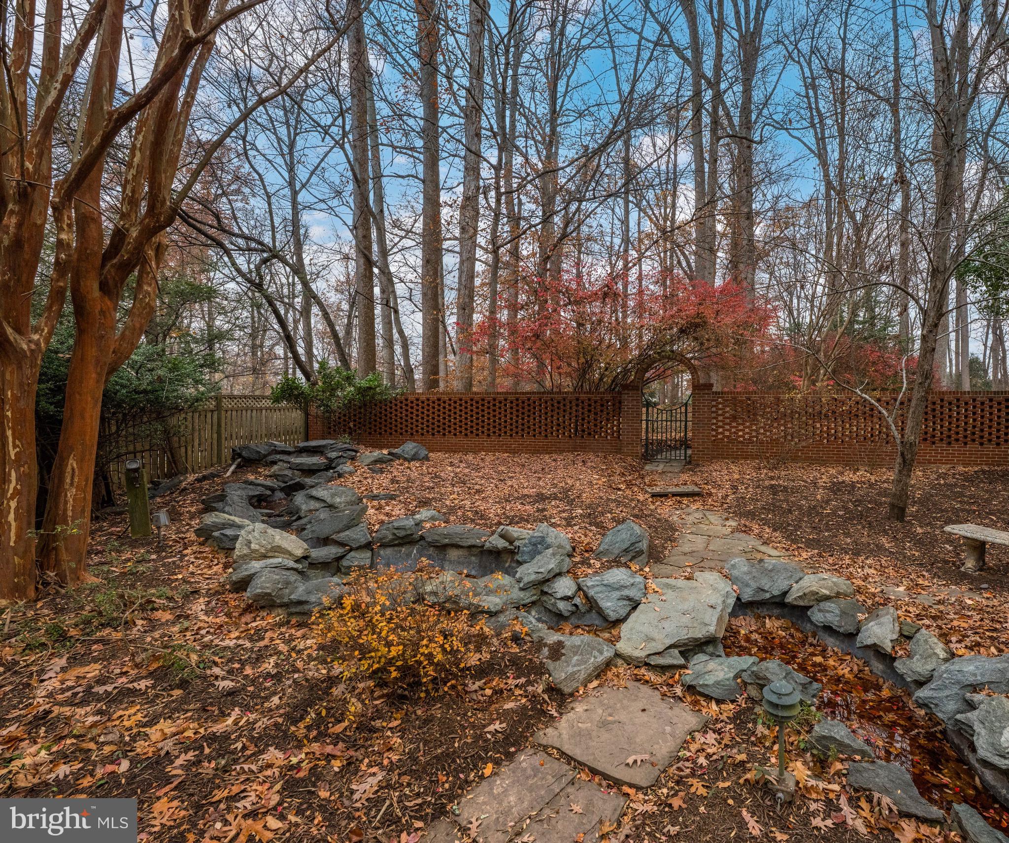 11552 Springridge Road Potomac, MD 20854 - Photo 60 of 65 a backyard of a house with lots of green space