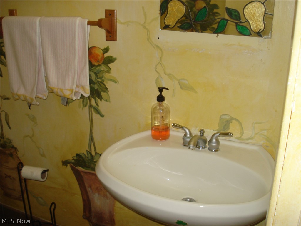 7342 Hopkins Road Mentor, OH 44060 - Photo 36 of 49 half bath off the kitchen