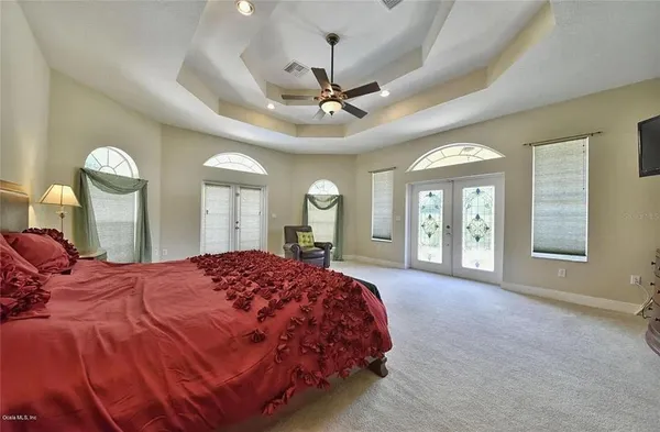a large bathroom with a granite countertop sink mirror and a