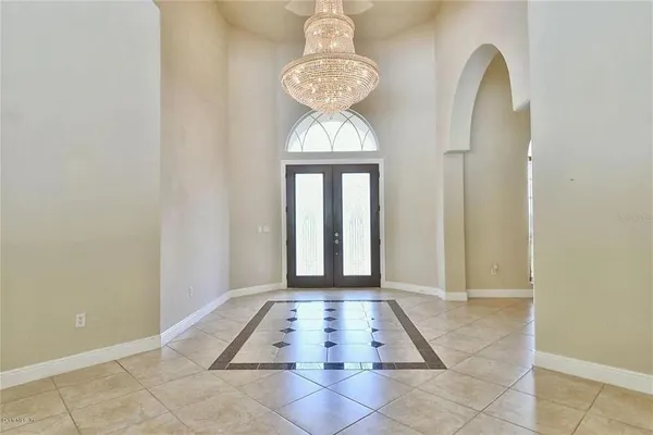 a view of a entryway door with wooden floor