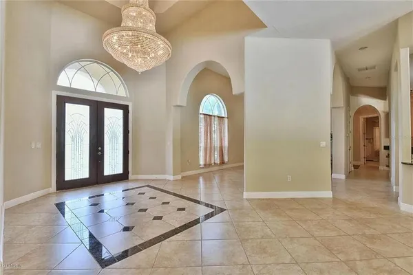 a view of a livingroom with furniture and window