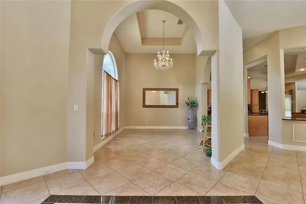 a view of living room and kitchen