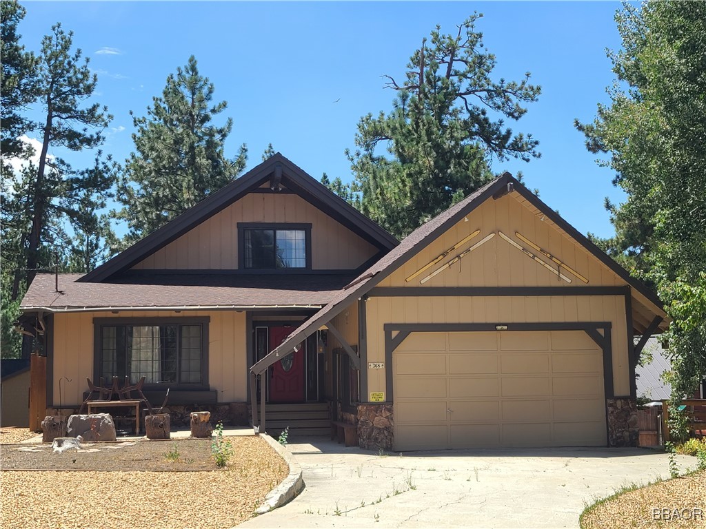 368 Pulaski Road Big Bear Lake, CA 92315 - Photo 1 of 44 a front view of a house with garden