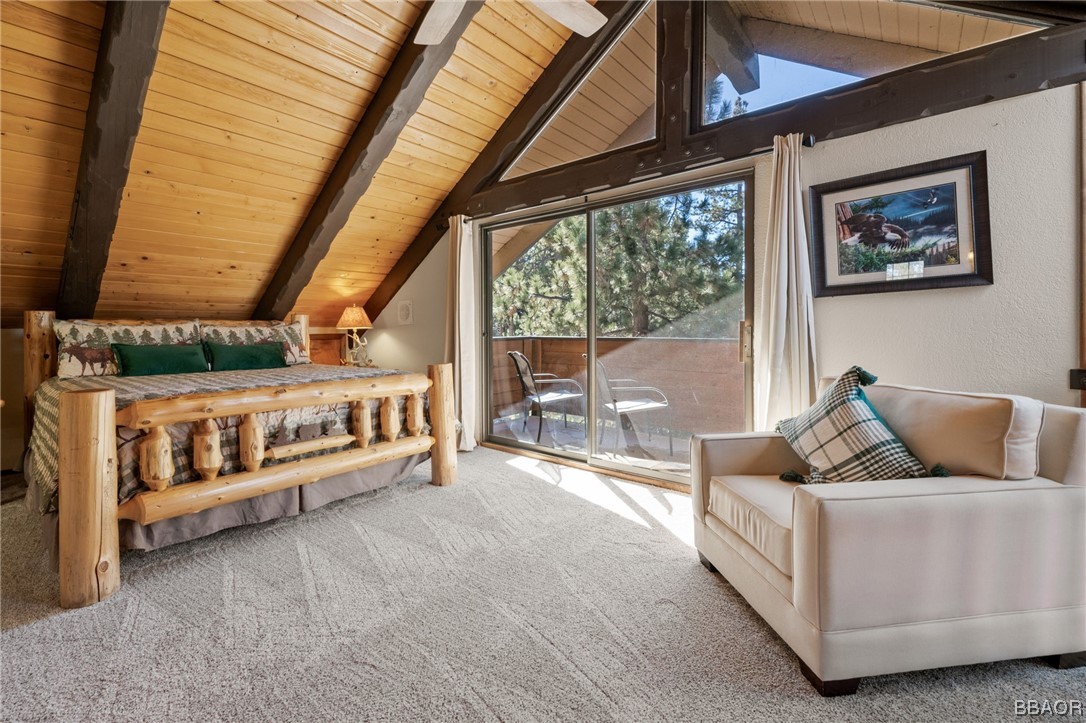 368 Pulaski Road Big Bear Lake, CA 92315 - Photo 19 of 44 a living room with furniture and a floor to ceiling window