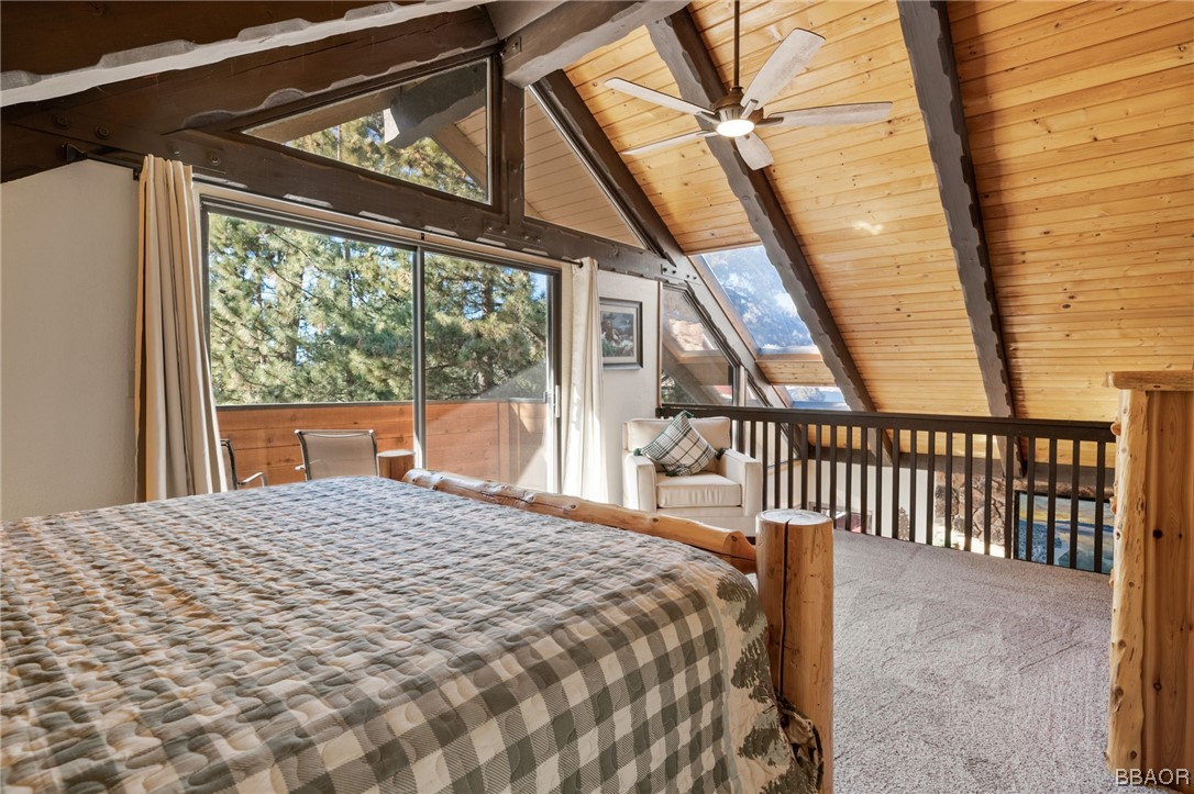 368 Pulaski Road Big Bear Lake, CA 92315 - Photo 20 of 44 a bedroom with a bed and a large window