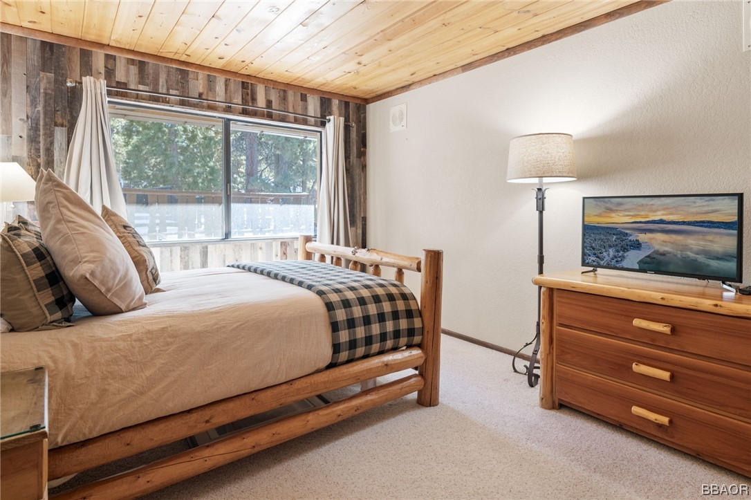 368 Pulaski Road Big Bear Lake, CA 92315 - Photo 27 of 44 a bedroom with a bed and a window