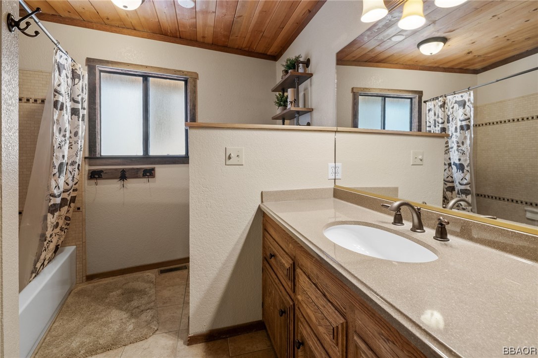 368 Pulaski Road Big Bear Lake, CA 92315 - Photo 28 of 44 a bathroom with a sink double vanity and a mirror