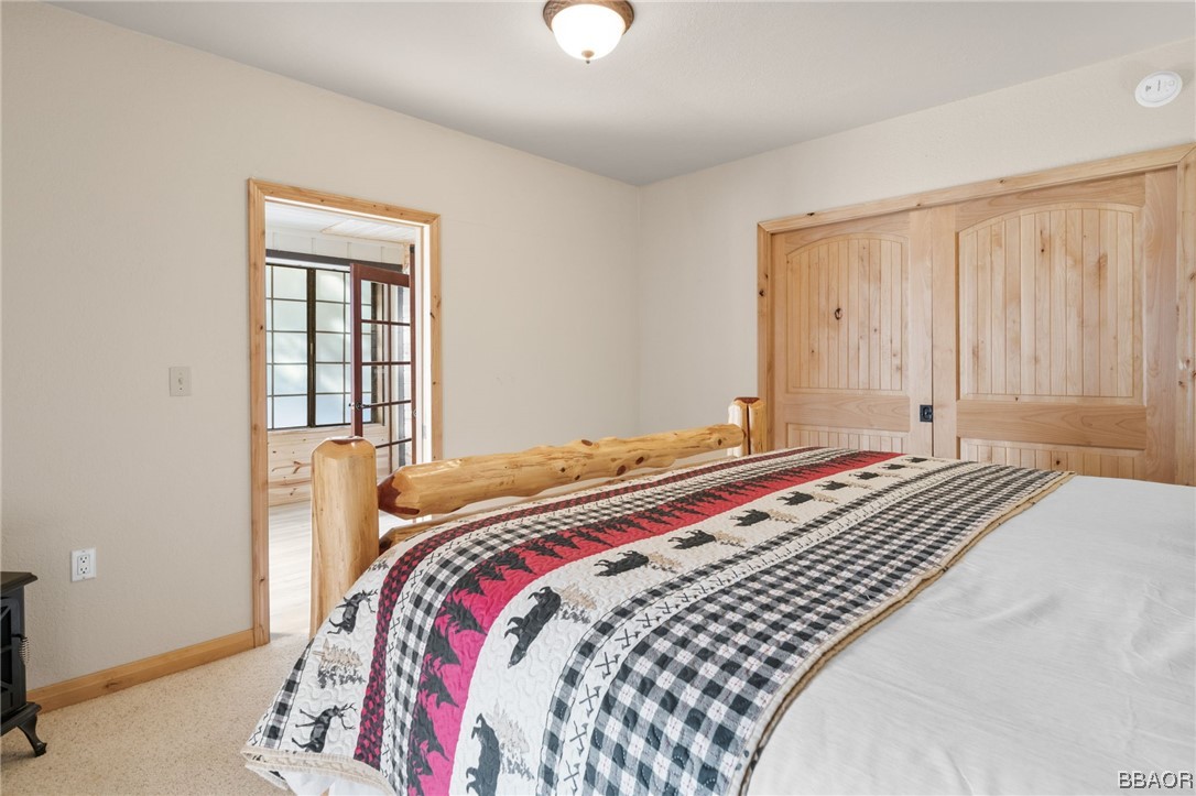 368 Pulaski Road Big Bear Lake, CA 92315 - Photo 36 of 44 a bedroom with bed and a window