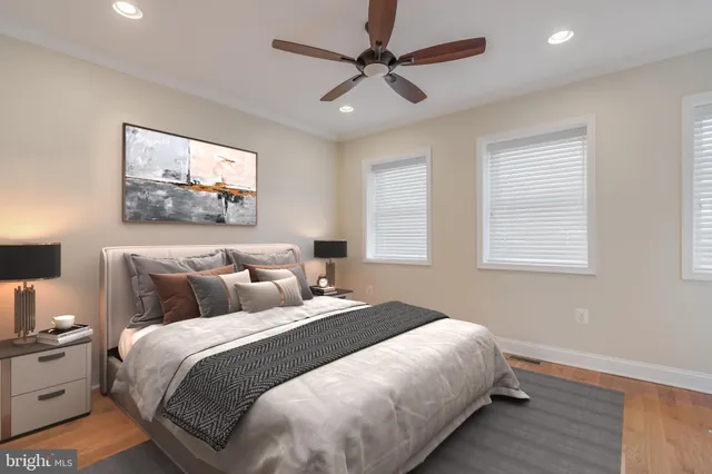 a bedroom with bed and window