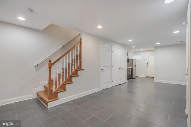 a view of an entryway with stairs