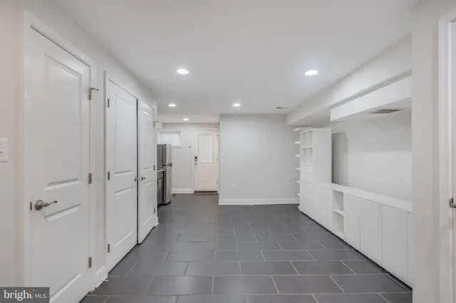 a view of entryway with white walls