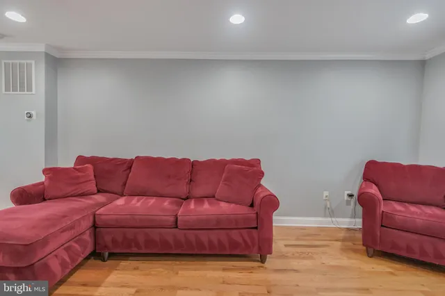 a living room with furniture and a couch