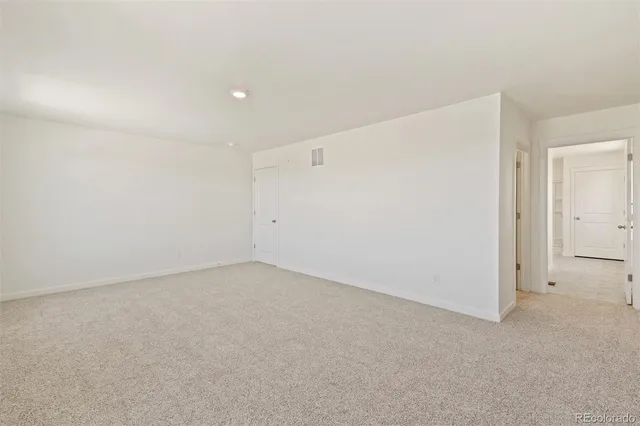 a bathroom with a shower sink and mirror