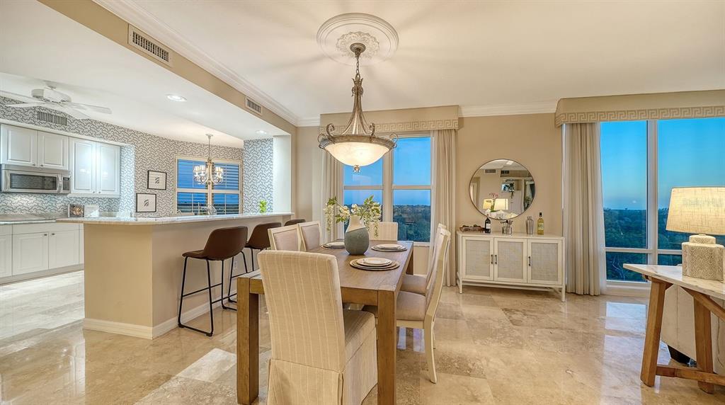385 North Point Road, Unit 701 Osprey, FL 34229 - Photo 36 of 97 a view of a dining room kitchen and a window