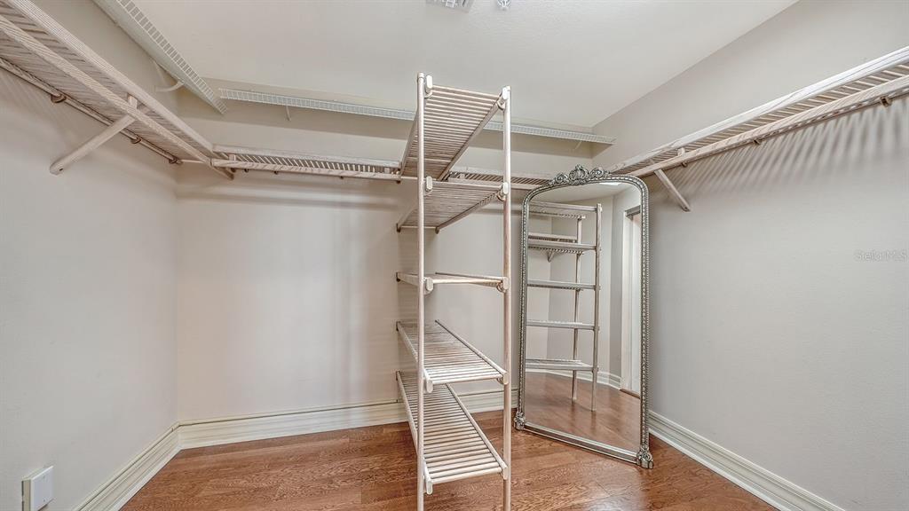 385 North Point Road, Unit 701 Osprey, FL 34229 - Photo 54 of 97 a view of an empty walk in closet