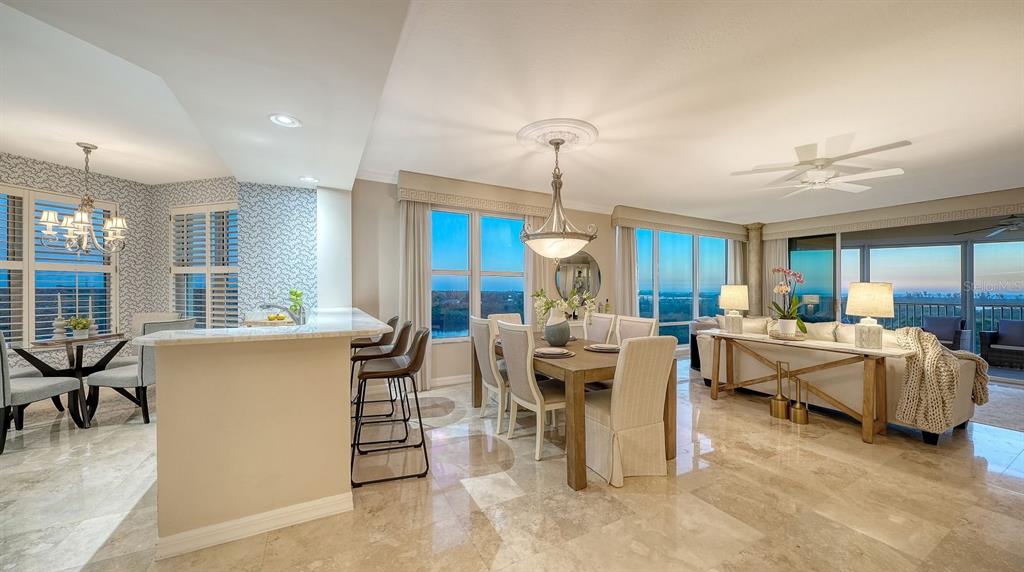385 North Point Road, Unit 701 Osprey, FL 34229 - Photo 9 of 97 a view of a dining room with furniture window and outside view