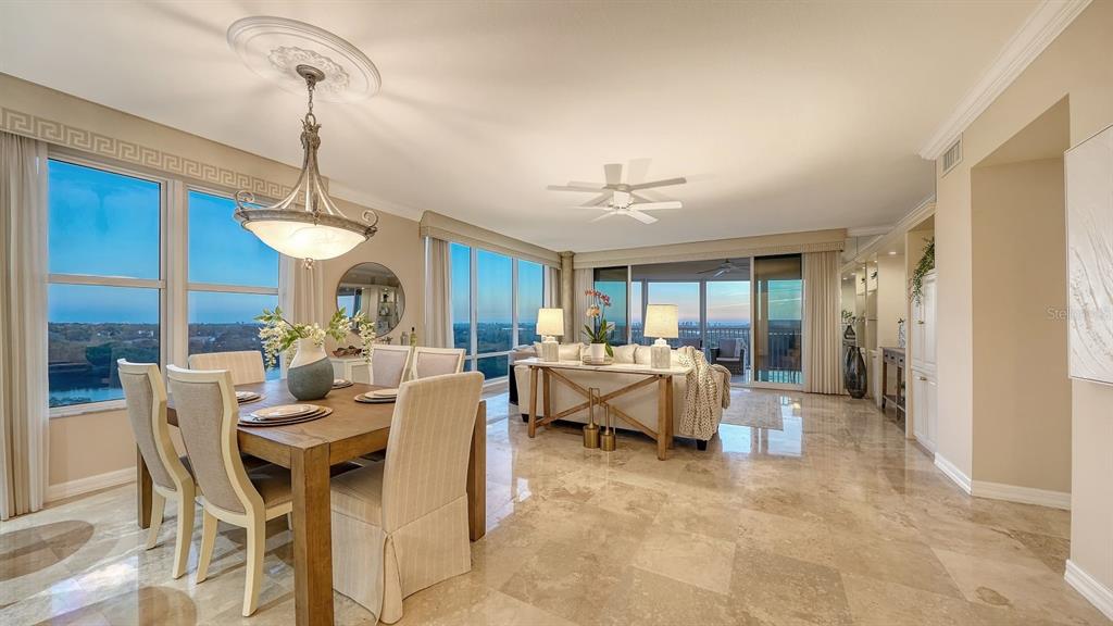 385 North Point Road, Unit 701 Osprey, FL 34229 - Photo 10 of 97 a view of a dining room with furniture window and outside view