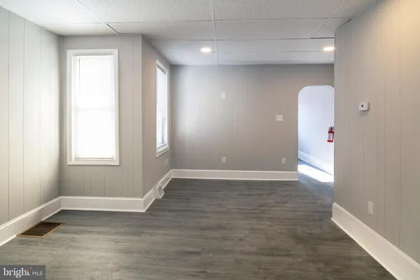 a view of an empty room and window