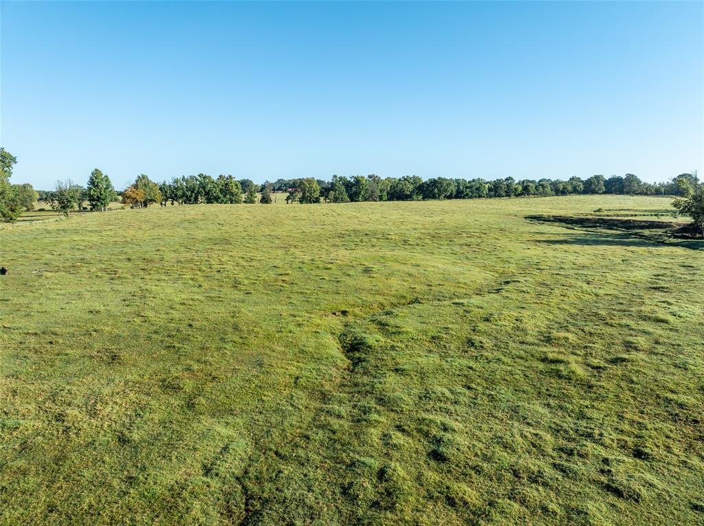 2661 Holly Creek Road Broken Bow, OK 74728 - Photo 15 of 33 a view of a lake with houses in the back