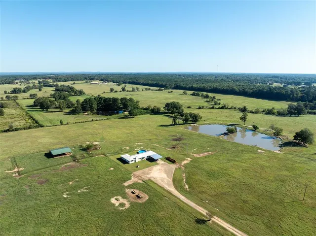 a view of a lake with a big yard