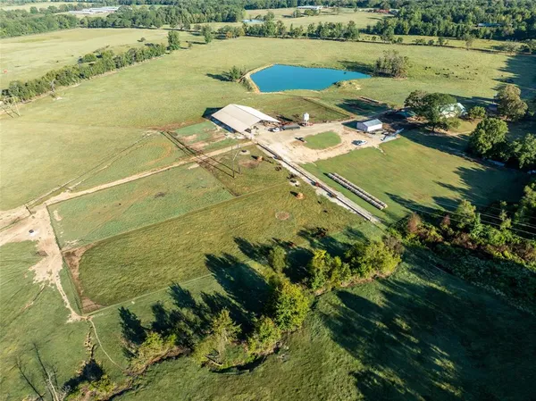 a view of a lake with a yard
