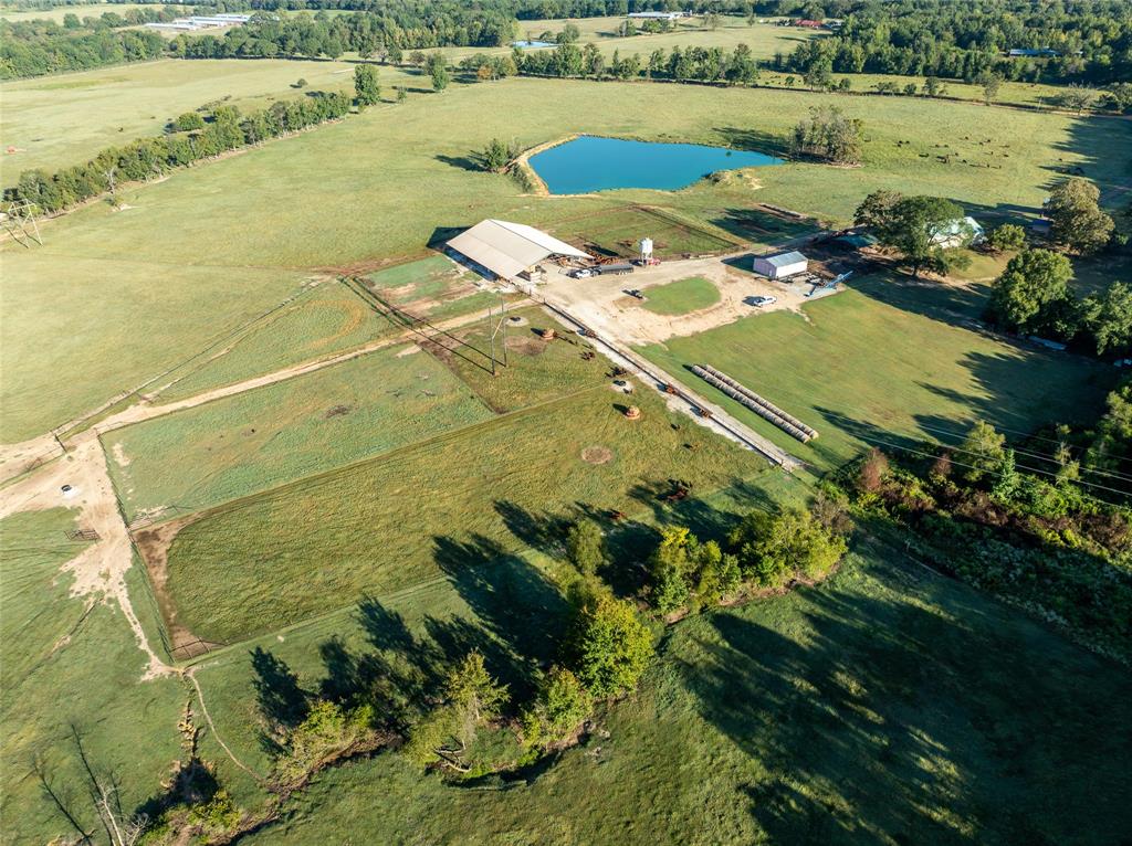 2661 Holly Creek Road Broken Bow, OK 74728 - Photo 3 of 33 a view of a lake with a yard