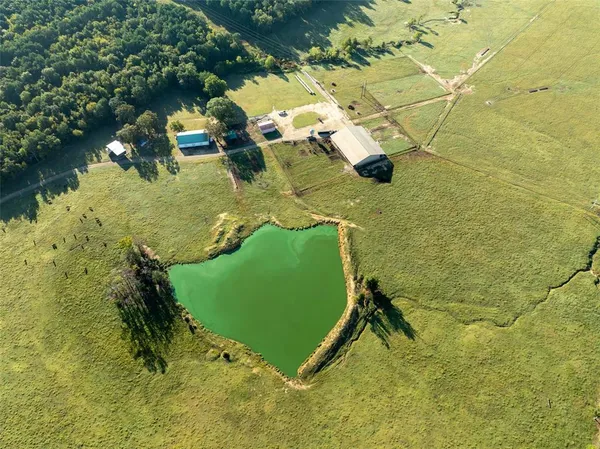 a view of a swimming pool with a lake view