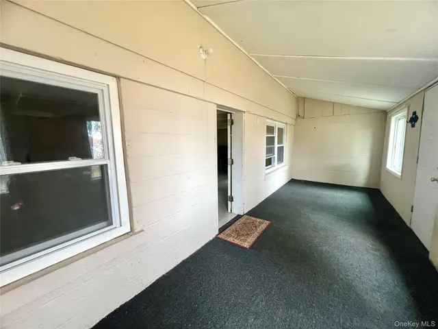 a view of a lake with a bench