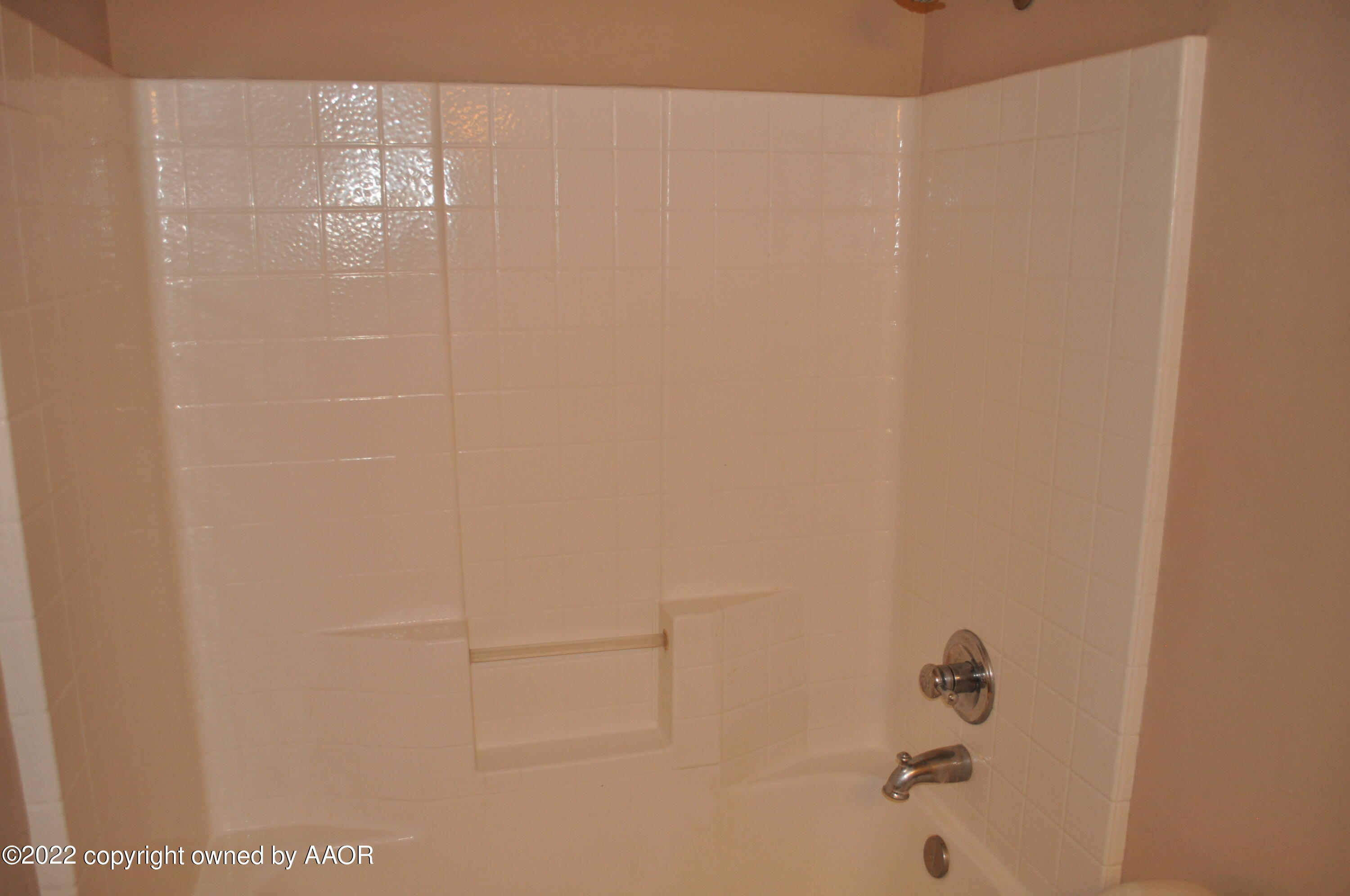 601 B 5th Street Canyon, TX 79015 - Photo 11 of 16 a bathroom with a shower