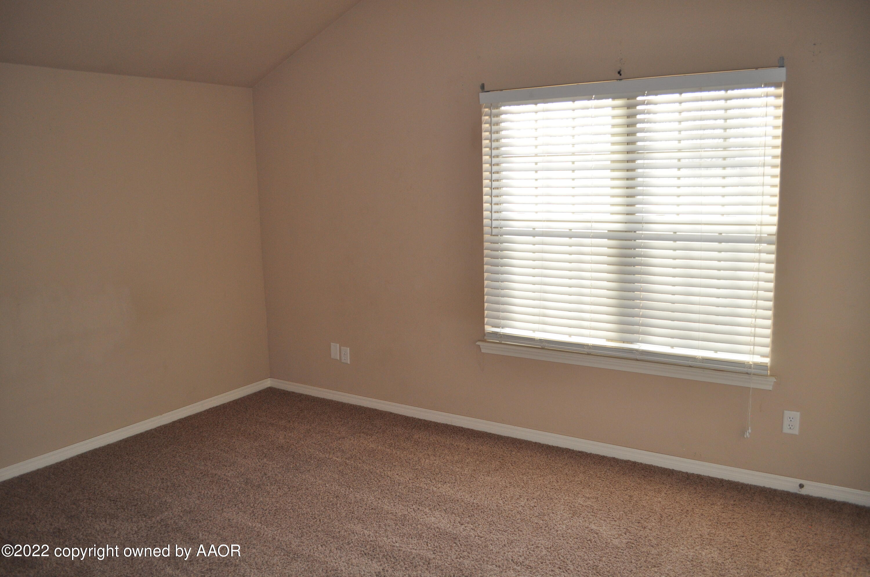601 B 5th Street Canyon, TX 79015 - Photo 12 of 16 an empty room with a window