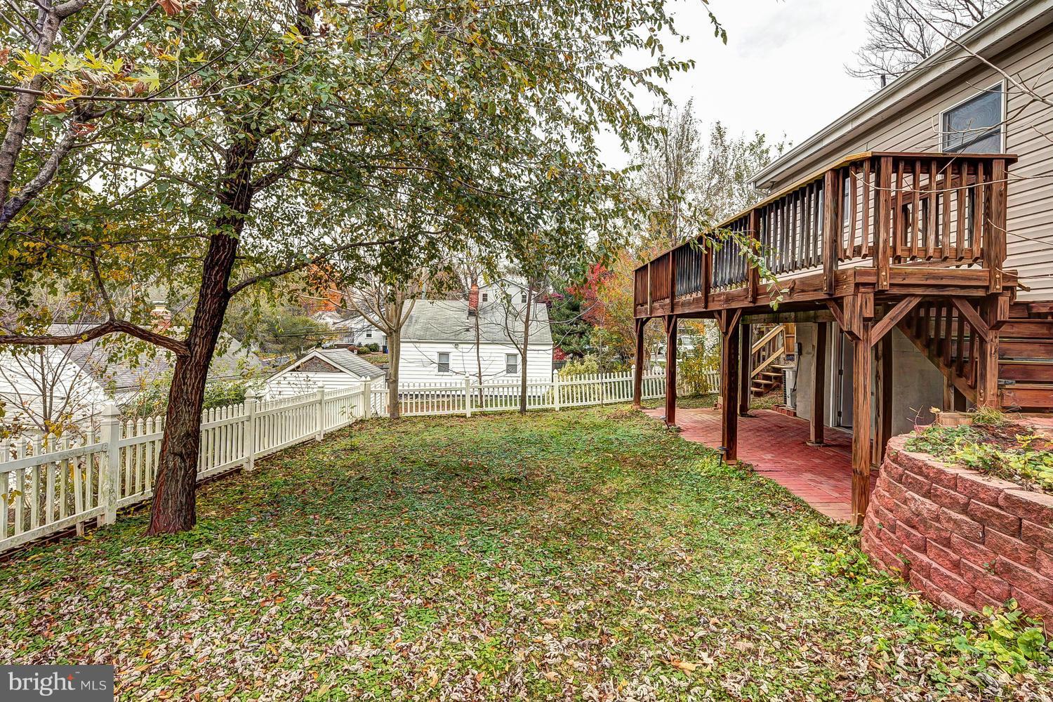 11520 Joseph Mill Road Silver Spring, MD 20906 - Photo 22 of 30 a backyard of a house with lots of green space