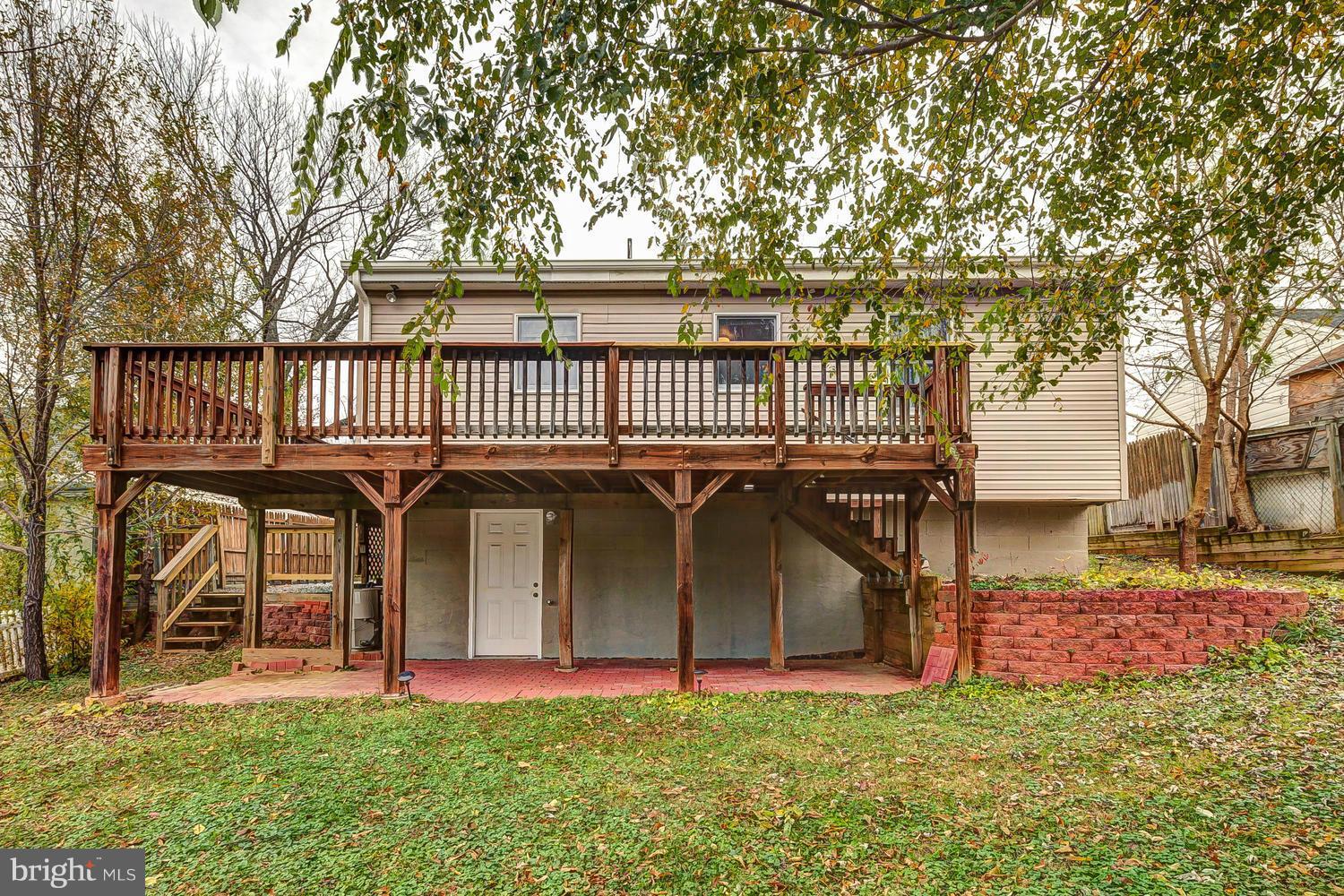 11520 Joseph Mill Road Silver Spring, MD 20906 - Photo 25 of 30 a view of a house with a yard