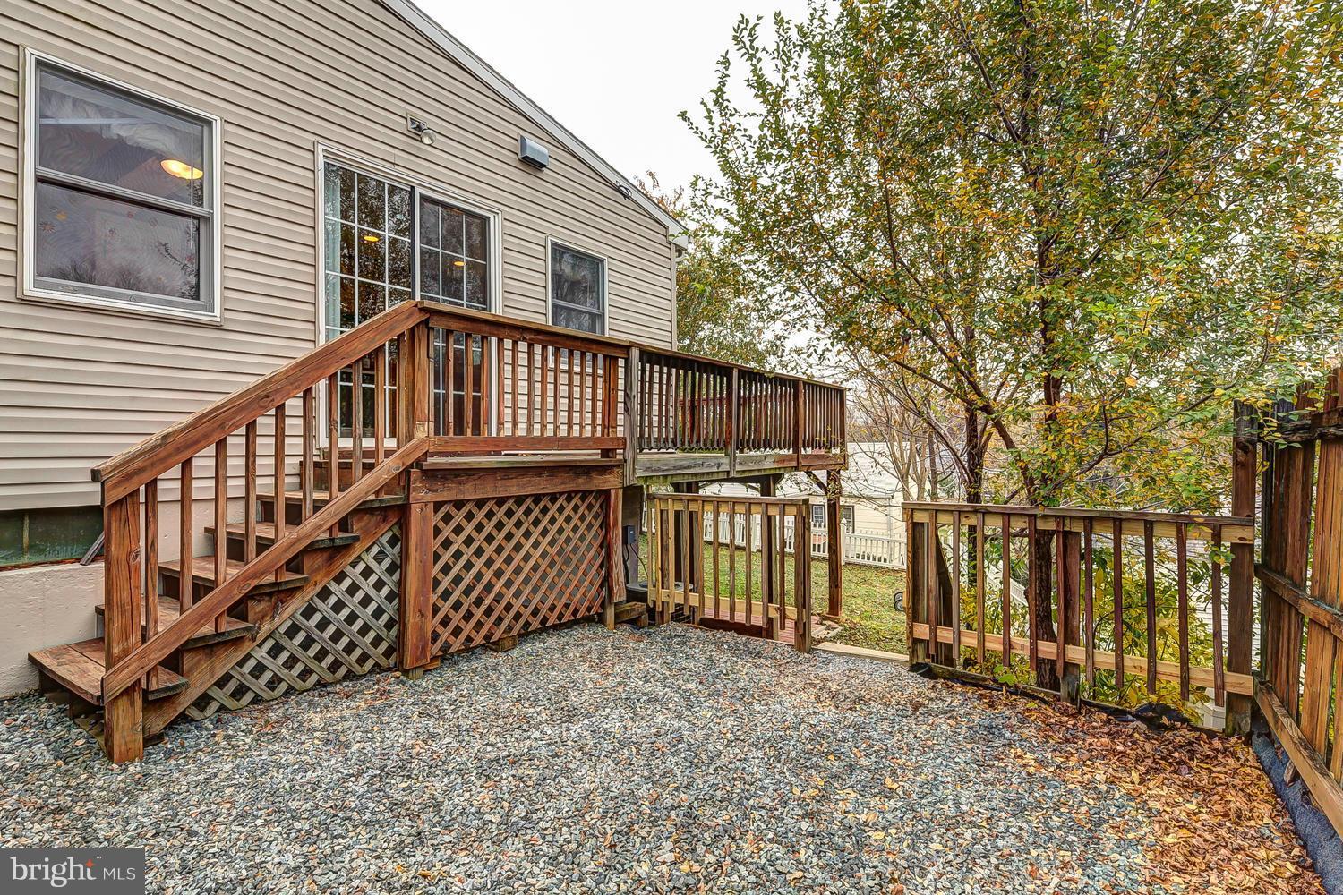 11520 Joseph Mill Road Silver Spring, MD 20906 - Photo 27 of 30 a view of a house with a wooden deck