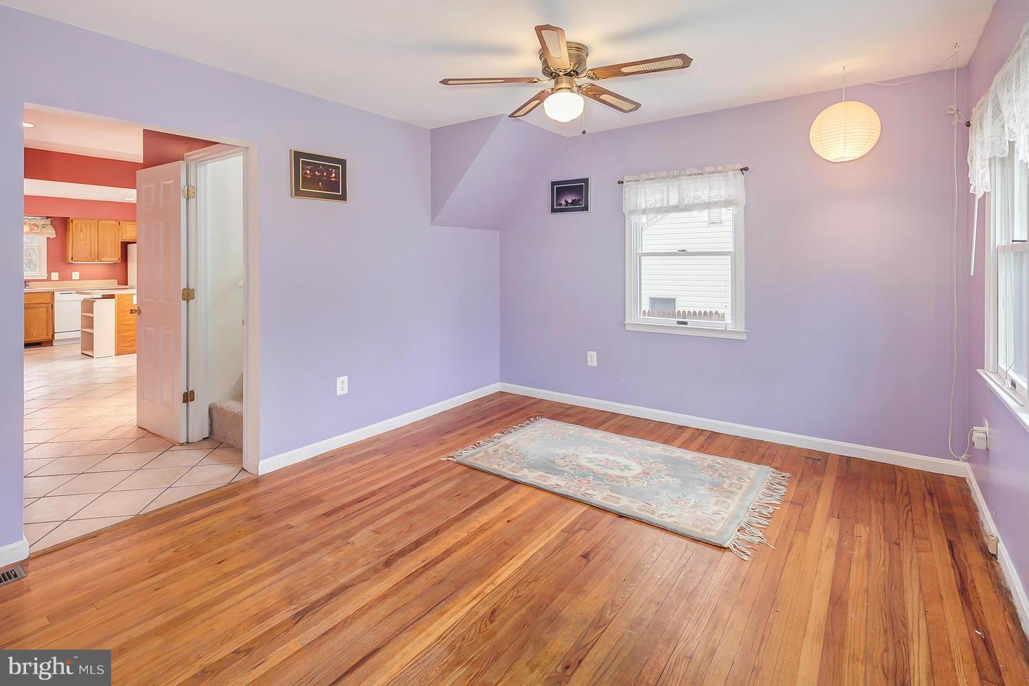 11520 Joseph Mill Road Silver Spring, MD 20906 - Photo 4 of 30 a view of empty room with wooden floor