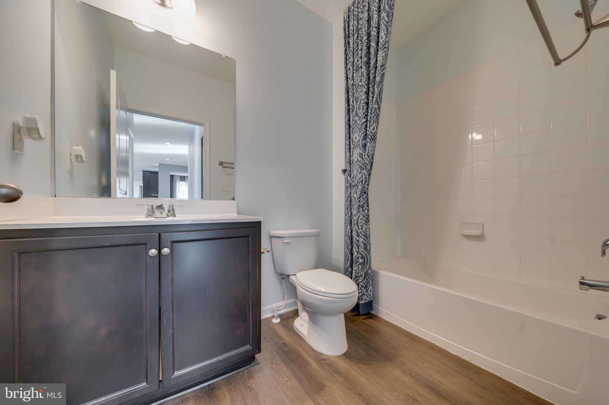 800 Naeve Court Accokeek, MD 20607 - Photo 18 of 56 a bathroom with a sink toilet and shower