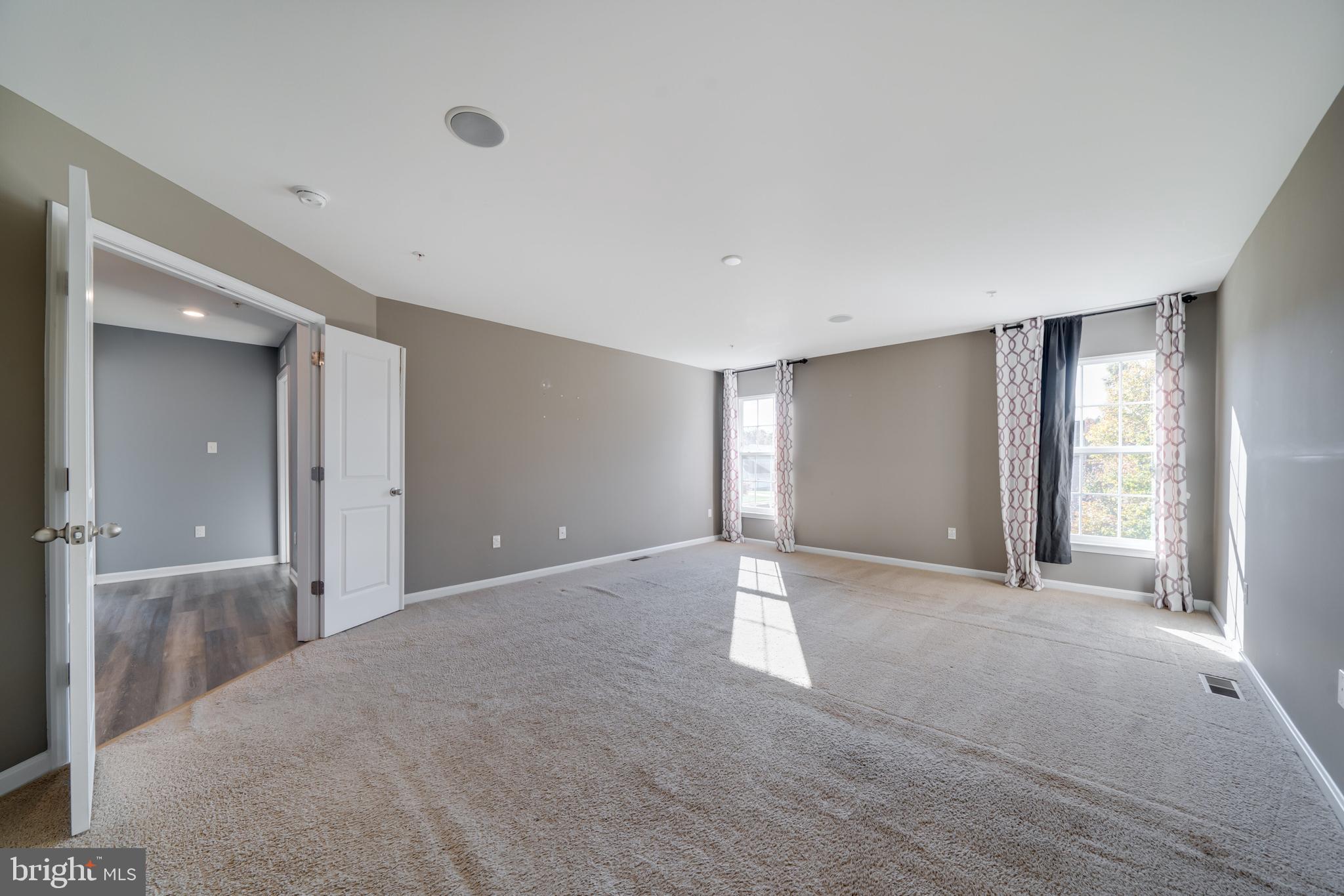 800 Naeve Court Accokeek, MD 20607 - Photo 25 of 56 a view of an empty room with window and chandelier
