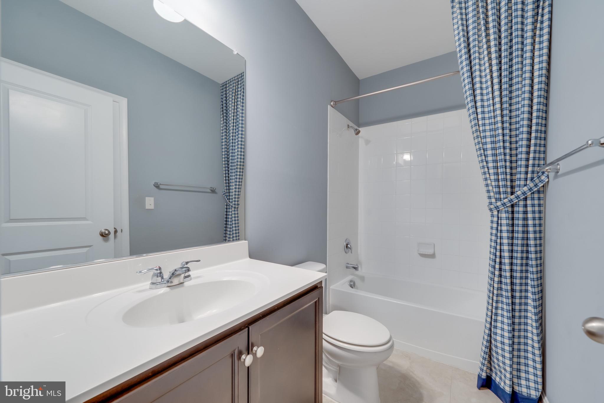 800 Naeve Court Accokeek, MD 20607 - Photo 43 of 56 a bathroom with a sink a toilet and shower